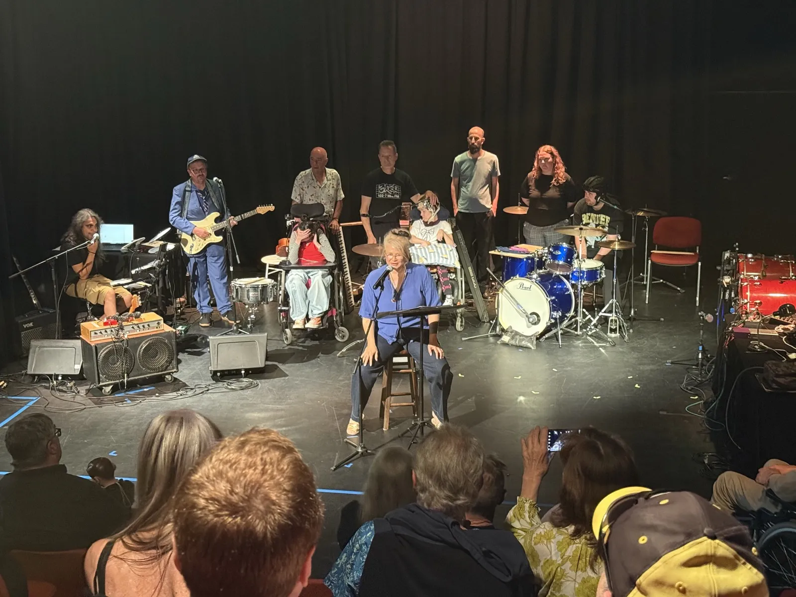 A mixed-ability ensemble performing on stage at the Safe in Sound Festival